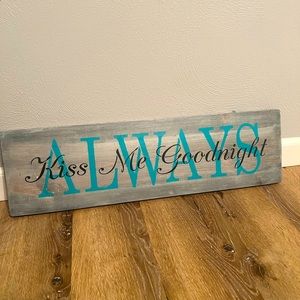 Always kiss me goodnight wall sign.